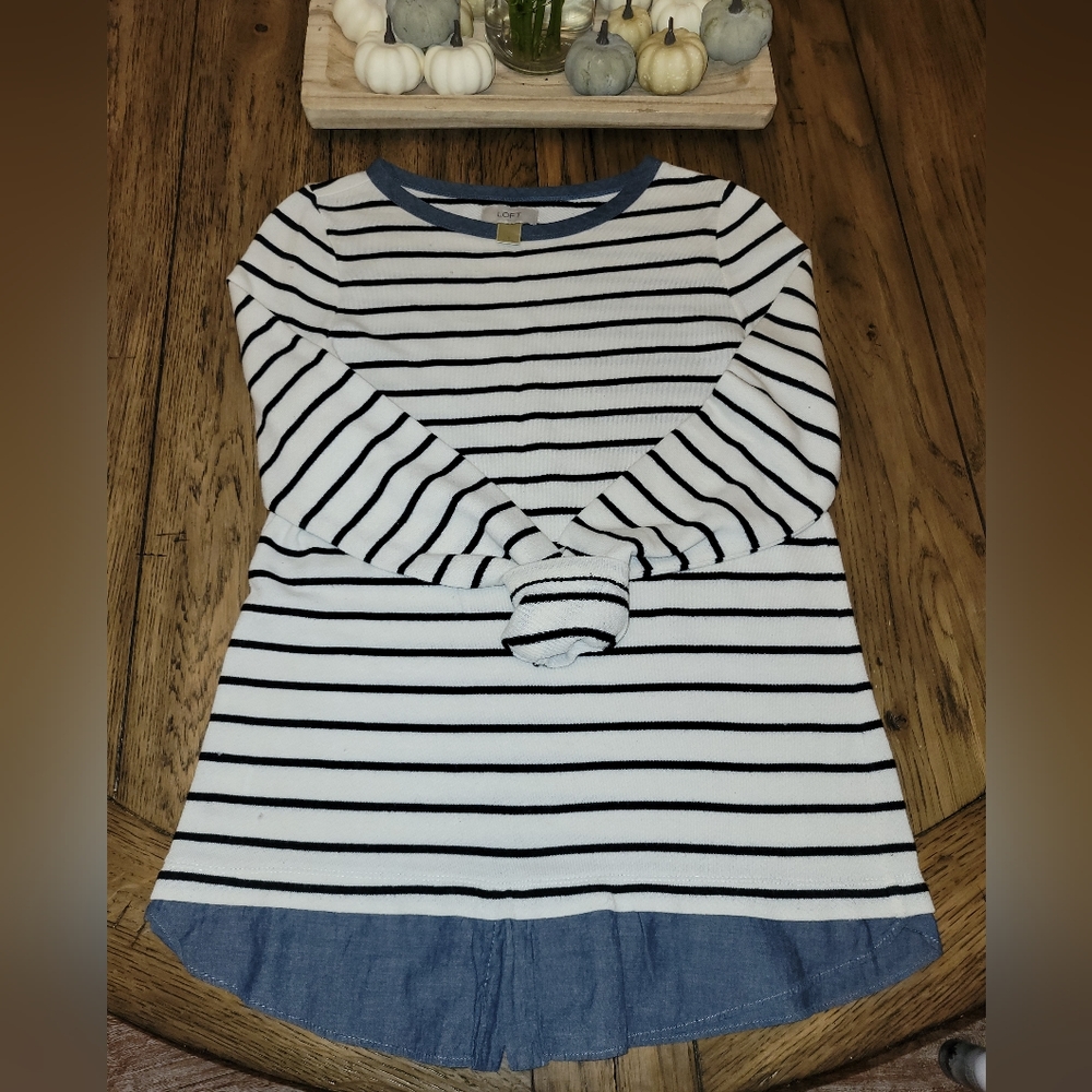 Lightweight long-sleeved top with layered illusion.